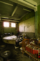 Trashed crib boat with children's bed and dollhouse