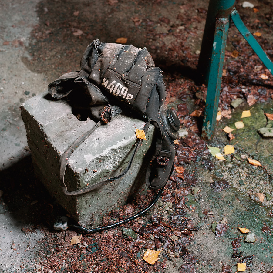 Tank crew helmet in one of the barrack attics at Soviet Military Base FZ. Former DDR, Germany. October 2013.