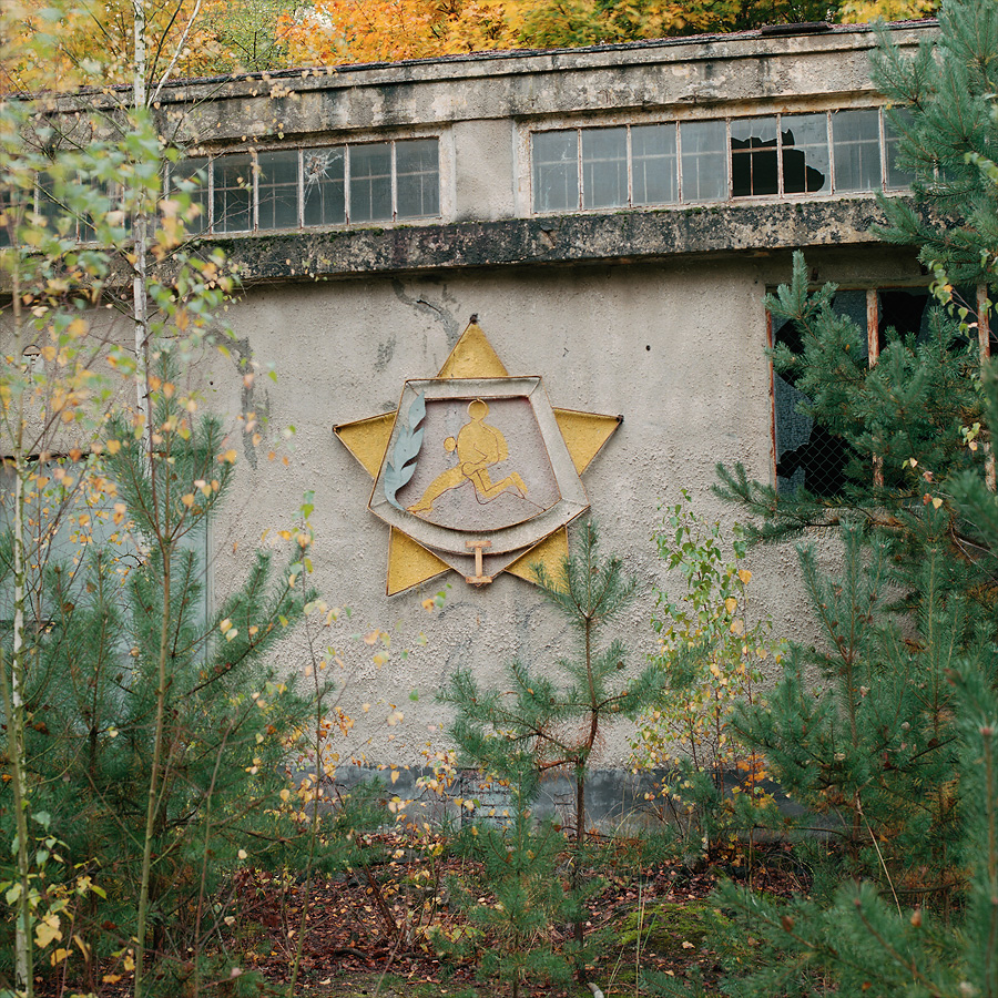 The Number One badge one the outside wall of a gym at Soviet Military Base FZ. Former DDR, Germany. October 2013.