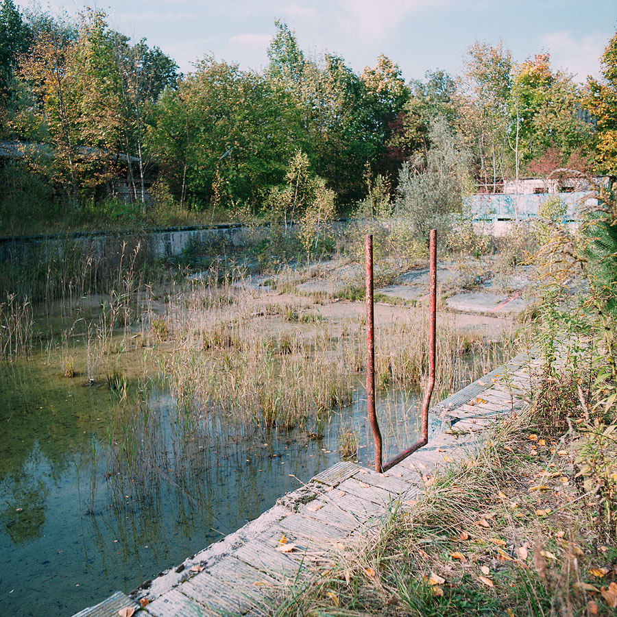 The abandoned swimming pool at Military Base SW. Former DDR, Germany. October 2014.