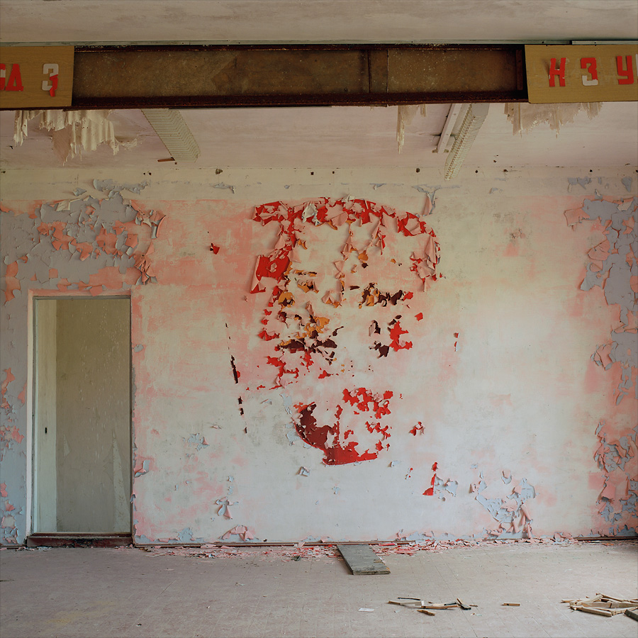 Very flaking Lenin mural inside the hospital building at Soviet Military Base V. Former DDR, Germany. October 2011.